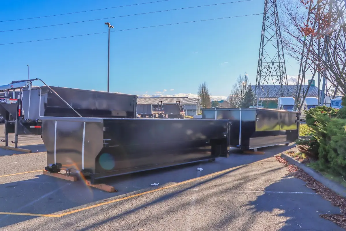 Roll-off dumpster ready for waste disposal at job site for Construction Dumpster Rental in Daytona Beach Shores